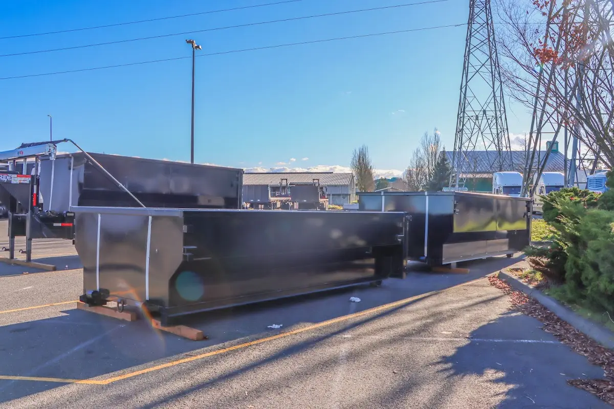 Roll-off dumpster ready for waste disposal at job site for Roofing Dumpster Rental in Ayden